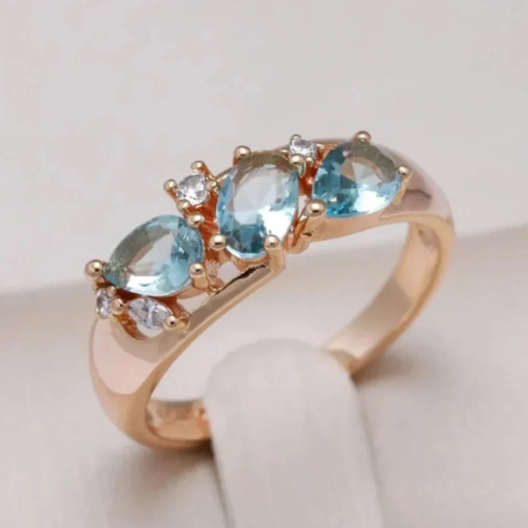 Gold Ring with Cut Blue Zirconia